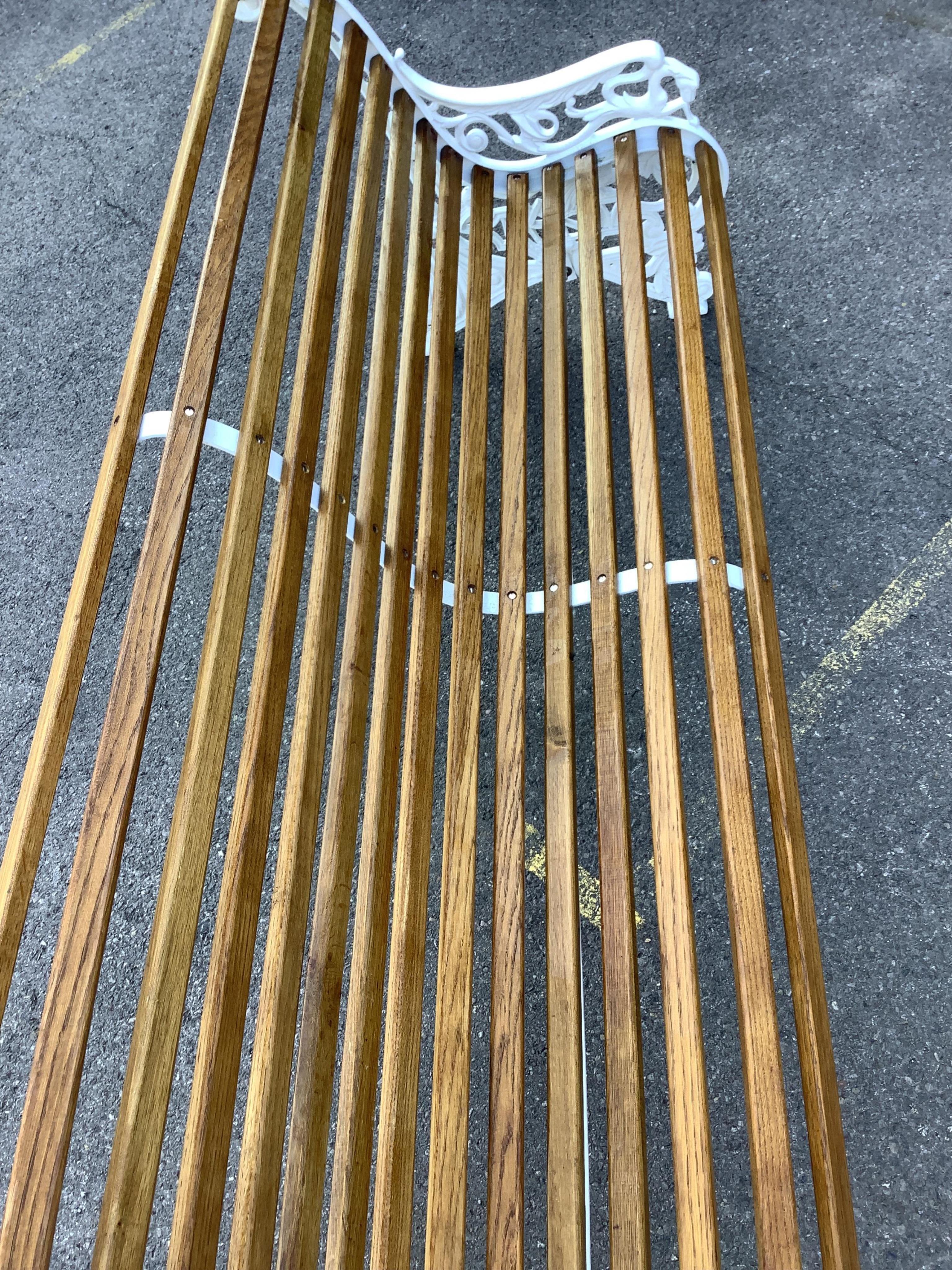 A Victorian style Coalbrookdale design cast iron garden bench (fully restored with varnished oak slats), width 178cm, depth 70cm, height 80cm. Condition - very good